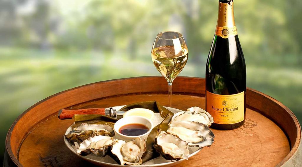 champagne e ostras: cientistas desvendam o segredo da combinação
