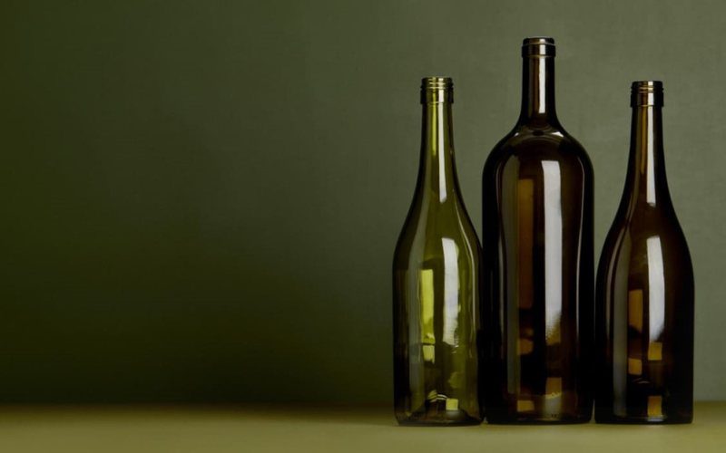 o papel da cor da garrafa de vinho